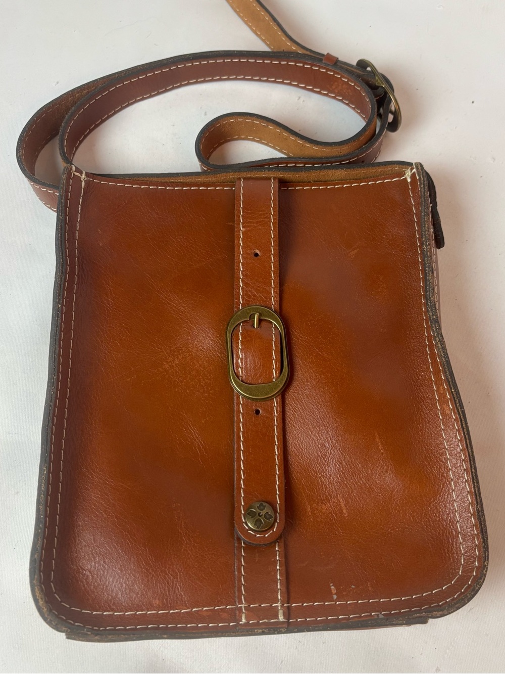 Patricia Nash Saddle Tan Leather Crossbody with Antique Brass Buckle